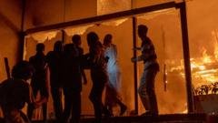 Bangladesh newspaper staff recall ‘gasping for air’ as offices set ablaze