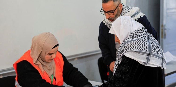 palestinians vote in first elections since gaza war