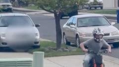 driver arrested after chasing down child cyclist on footpath